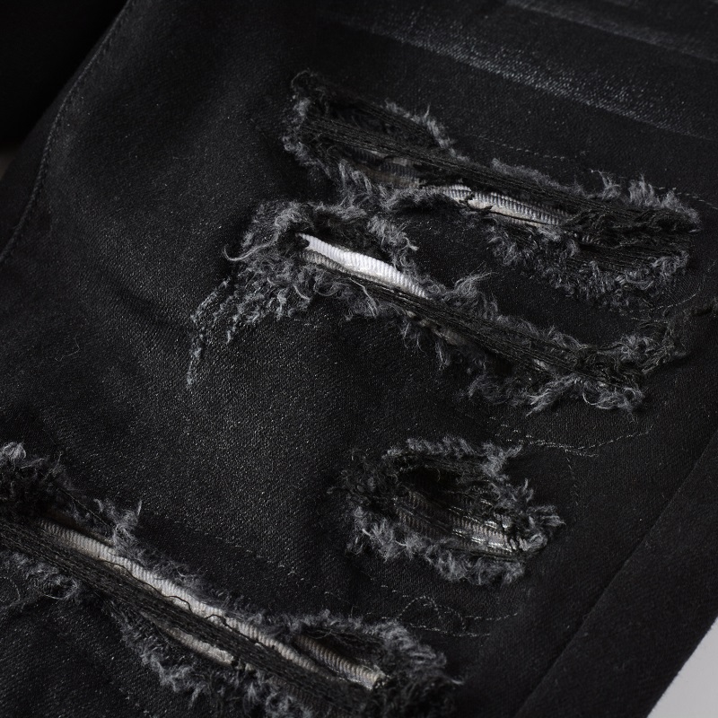 Heren zwarte noodlijdende band - Skinny Jeans Ripped recensie en prijs